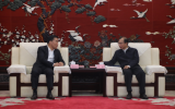 明阳集团党委书记、董事长张传卫拜会中国华电党组书记、董事长江毅
