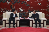 明阳集团党委书记、董事长张传卫拜会中国华电党组书记、董事长江毅